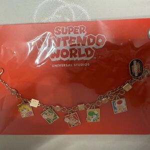 Super Nintendo Gold Charm Bracelet - Red Enamel Character Charms